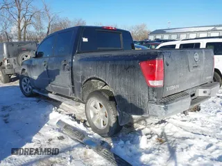 2012 Nissan Titan S with VIN 1N6AA0EJ3CN312305, listed as a IAAI auction lot 41339259 with 147,608 mi miles. Bid and sale history available at carsss.com. Image 3.