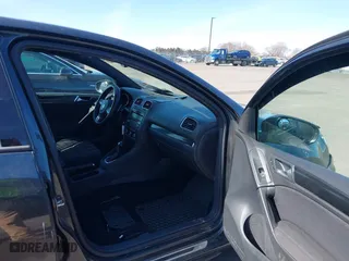 2014 Volkswagen GTI Driver's Edition with VIN WVWHD7AJ8EW003725, listed as a IAAI auction lot 41772639 with 131,500 mi miles. Bid and sale history available at carsss.com. Image 5.