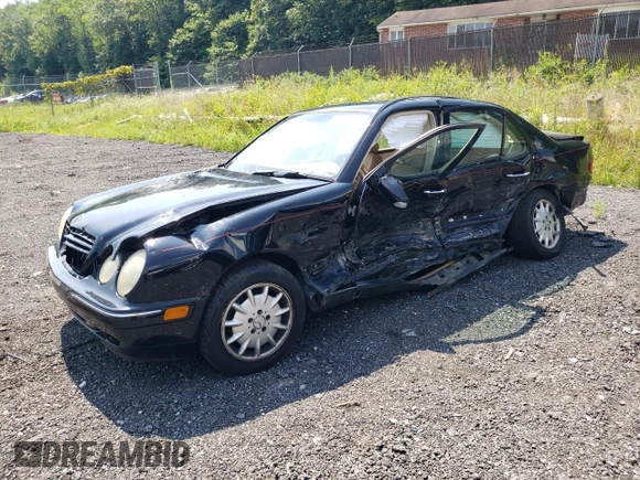2002 Mercedes-Benz E-Class with VIN WDBJF82J62X067198, listed as a Copart auction lot 66073494 with 0 mi miles and Salvage Title. Bid and sale history available at carsss.com. Image 1.