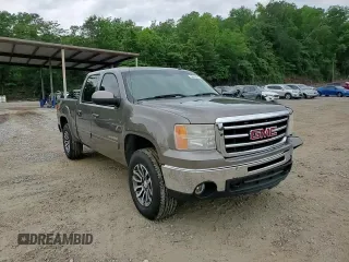 2012 GMC Sierra 1500 SLT with VIN 3GTP2WE74CG310914, listed as a Copart auction lot 56049905 with 106,882 mi miles and Salvage title. Bid and sale history available at DreamBid. Image 13.