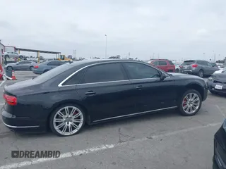 2015 Audi A8 L 4.0T with VIN WAU32AFD4FN033471, listed as a IAAI auction lot 42120112 with 174,882 mi miles. Bid and sale history available at carsss.com. Image 13.