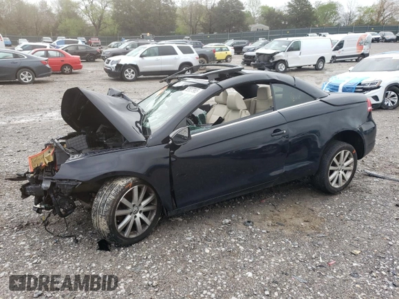 2013 Volkswagen Eos Komfort with VIN WVWBW8AH1DV006523, listed as a Copart auction lot 52037965 with 77,746 mi miles and Salvage Title. Bid and sale history available at DreamBid. Image 1.