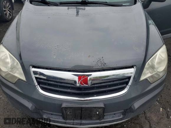 2009 Saturn VUE XE z VIN 3GSCL33P69S509003, wystawiony jako Copart lot #57164165 z przebiegiem 134 858 mil mil oraz Szkody całkowita. Historia ofert i sprzedaży dostępna na DreamBid. Obrazek 11.