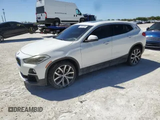 2018 BMW X2 sDrive28i with VIN WBXYJ3C33JEB38083, listed as a Copart auction lot 47923995 with 101,406 mi miles and Salvage Title. Bid and sale history available at carsss.com. Image 1.