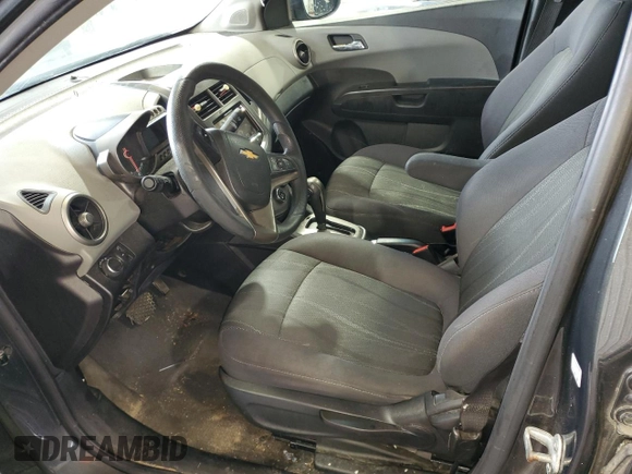 2014 Chevrolet Sonic LT z VIN 1G1JC5SH1E4118997, wystawiony jako Copart lot #70792334 z przebiegiem 166 691 mil mil oraz Szkoda całkowita • Salvage title. Historia ofert i sprzedaży dostępna na DreamBid. Obrazek 7.
