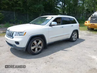 2011 Jeep Grand Cherokee Overland with VIN 1J4RR6GG3BC587857, listed as a IAAI auction lot 42879845 with 165,572 mi miles and . Bid and sale history available at DreamBid. Image 2.