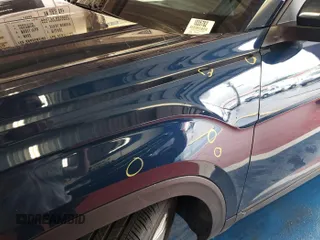 2023 Volkswagen Atlas SE z VIN 1V2HR2CA5PC527628, wystawiony jako IAAI lot #42569146 z przebiegiem 27 424 mil mil oraz . Historia ofert i sprzedaży dostępna na DreamBid. Obrazek 17.