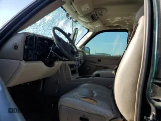 2004 Chevrolet Tahoe LS z VIN 1GNEC13Z24R174609, wystawiony jako Copart lot #52234105 z przebiegiem 182 306 mil mil oraz Szkoda całkowita • Salvage title. Historia ofert i sprzedaży dostępna na DreamBid. Obrazek 7.