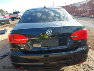 2012 Volkswagen Jetta Sedan TDI w/Premium with VIN 3VWLL7AJ2CM426050, listed as a IAAI auction lot 41332817 with 111,996 mi miles. Bid and sale history available at carsss.com. Image 16.