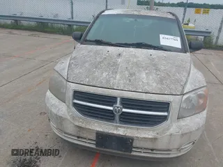 2009 Dodge Caliber SXT z VIN 1B3HB48A29D108077, wystawiony jako IAAI lot #42417769 z przebiegiem 177 162 mil mil oraz . Historia ofert i sprzedaży dostępna na DreamBid. Obrazek 6.