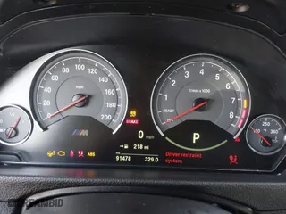 2018 BMW M3 with VIN WBS8M9C52J5K98356, listed as a IAAI auction lot 41593546 with 91,478 mi miles. Bid and sale history available at carsss.com. Image 7.