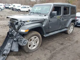 2023 Jeep Wrangler Sport with VIN 1C4HJXDN5PW522855, listed as a IAAI auction lot 41516522 with 49,607 mi miles and . Bid and sale history available at DreamBid. Image 2.