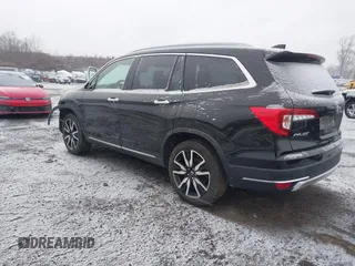 2022 Honda Pilot Touring 7-Passenger with VIN 5FNYF6H60NB005155, listed as a IAAI auction lot 41249979 with 65,712 mi miles. Bid and sale history available at carsss.com. Image 3.