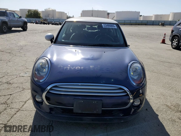 2014 MINI Hardtop with VIN WMWXM5C52ET932677, listed as a Copart auction lot 53486865 with 189,039 mi miles and Salvage title. Bid and sale history available at DreamBid. Image 5.