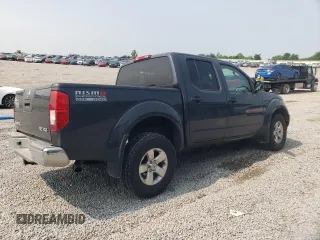 2010 Nissan Frontier LE with VIN 1N6AD0EV3AC407062, listed as a Copart auction lot 60444785 with 96,631 mi miles and Salvage title. Bid and sale history available at DreamBid. Image 3.