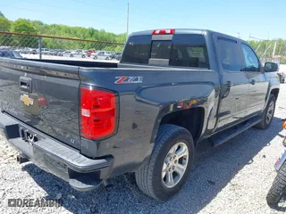 2017 Chevrolet Silverado 1500 LT with VIN 3GCUKREC3HG462501, listed as a IAAI auction lot 42050327 with 183,688 mi miles. Bid and sale history available at carsss.com. Image 4.