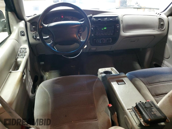2000 Ford Explorer XLS z VIN 1FMZU72X7YUA71727, wystawiony jako Copart lot #51416935 z przebiegiem 163 005 mil mil oraz Szkoda całkowita • Salvage title. Historia ofert i sprzedaży dostępna na DreamBid. Obrazek 8.