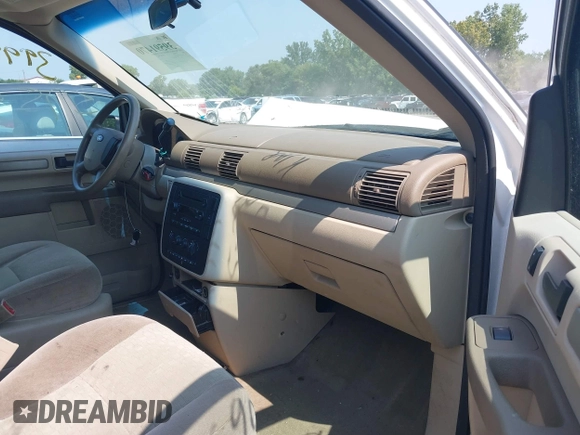 2006 Ford Freestar SE z VIN 2FMDA51666BA57711, wystawiony jako IAAI lot #39989040 z przebiegiem Nie podano mil oraz . Historia ofert i sprzedaży dostępna na DreamBid. Obrazek 5.
