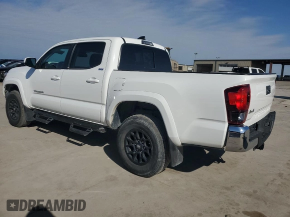 2022 Toyota Tacoma SR with VIN 3TMCZ5AN3NM506811, listed as a Copart auction lot 84630754 with 32,099 mi miles and Salvage title. Bid and sale history available at DreamBid. Image 2.
