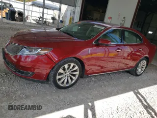2014 Lincoln MKS with VIN 1LNHL9DK0EG606922, listed as a Copart auction lot 73049844 with 97,129 mi miles and Salvage Title. Bid and sale history available at carsss.com. Image 1.