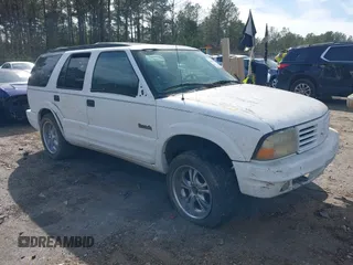 1998 Oldsmobile Bravada z VIN 1GHDT13W2W2706912, wystawiony jako IAAI lot #41629870 z przebiegiem 210 907 mil mil oraz . Historia ofert i sprzedaży dostępna na DreamBid. Obrazek 1.