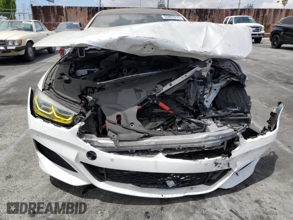 2021 BMW 8 Series M850i with VIN WBAGV8C04MCF56486, listed as a Copart auction lot 55991015 with 60,249 mi miles and Salvage title. Bid and sale history available at DreamBid. Image 5.