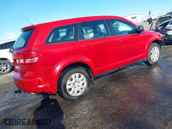 2015 Dodge Journey American Value Pkg with VIN 3C4PDCAB8FT610745, listed as a IAAI auction lot 41812606 with 252,734 mi miles. Bid and sale history available at carsss.com. Image 4.