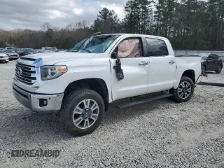 2018 Toyota Tundra SR5 with VIN 5TFAW5F14JX686052, listed as a Copart auction lot 47732995 with 165,576 mi miles and Salvage title. Bid and sale history available at DreamBid. Image 1.