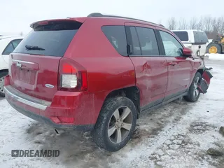 2016 Jeep Compass Latitude with VIN 1C4NJDEBXGD674518, listed as a IAAI auction lot 41956884 with 158,125 mi miles. Bid and sale history available at carsss.com. Image 4.