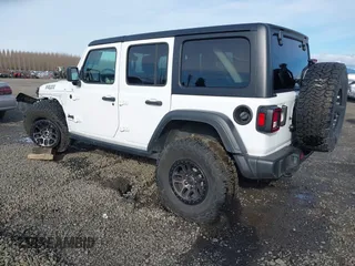 2023 Jeep Wrangler Sport with VIN 1C4HJXDG4PW567027, listed as a IAAI auction lot 41633197 with 14,782 mi miles and . Bid and sale history available at DreamBid. Image 3.
