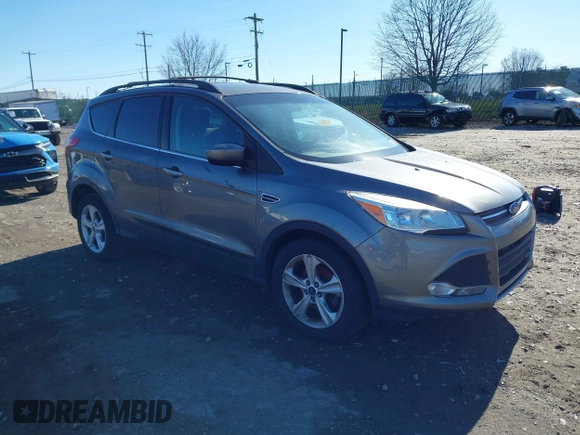 2014 Ford Escape SE with VIN 1FMCU0GXXEUB37821, listed as a IAAI auction lot 41853052 with 197,773 mi miles. Bid and sale history available at carsss.com. Image 1.