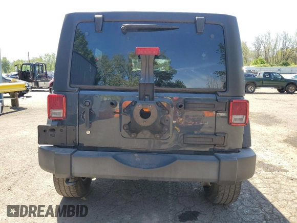 2017 Jeep Wrangler Unlimited Rubicon z VIN 1C4BJWFG6HL724069, wystawiony jako Copart lot #55773055 z przebiegiem 64 515 mil mil oraz Szkoda całkowita • Salvage title. Historia ofert i sprzedaży dostępna na DreamBid. Obrazek 6.