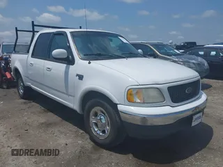 2001 Ford F-150 XLT with VIN 1FTRW07L91KB77612, listed as a IAAI auction lot 42432387 with 106,574 mi miles and . Bid and sale history available at DreamBid. Image 1.
