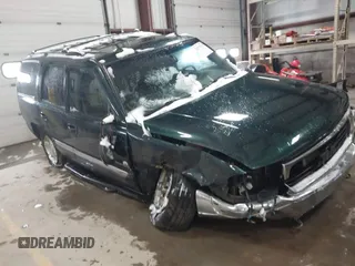 2004 GMC Yukon SLT with VIN 1GKEK13ZX4R198169, listed as a IAAI auction lot 41577015 with 169,562 mi miles. Bid and sale history available at carsss.com. Image 1.