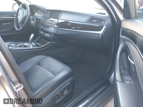 2014 BMW 5 Series 535i with VIN WBA5B1C54ED479873, listed as a IAAI auction lot 41338061 with 75,097 mi miles and . Bid and sale history available at DreamBid. Image 5.