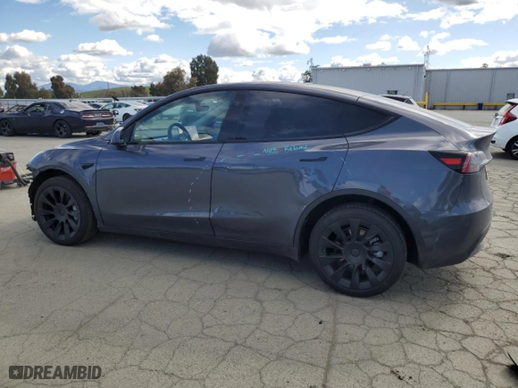 2023 Tesla Model Y Long Range with VIN 7SAYGDEE1PF891098, listed as a Copart auction lot 47829025 with 10,271 mi miles and Salvage Title. Bid and sale history available at carsss.com. Image 2.