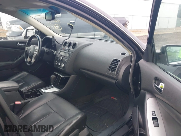 2009 Nissan Altima SL with VIN 1N4BL21E09N523885, listed as a IAAI auction lot 42532218 with 169,350 mi miles and . Bid and sale history available at DreamBid. Image 5.