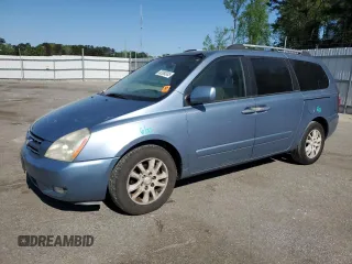 2008 Kia Sedona LX with VIN KNDMB233586210180, listed as a Copart auction lot 52090305 with 220,428 mi miles and Salvage Title. Bid and sale history available at carsss.com. Image 1.