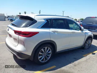 2019 Infiniti QX50 Luxe with VIN 3PCAJ5M10KF128308, listed as a IAAI auction lot 42242771 with 97,257 mi miles and . Bid and sale history available at DreamBid. Image 4.