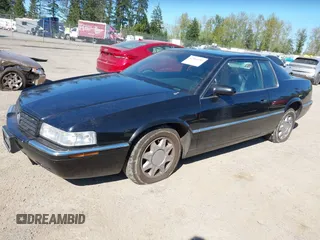 1998 Cadillac Eldorado Touring with VIN 1G6ET1295WU610253, listed as a IAAI auction lot 42066181 with 85,172 mi miles and . Bid and sale history available at DreamBid. Image 2.
