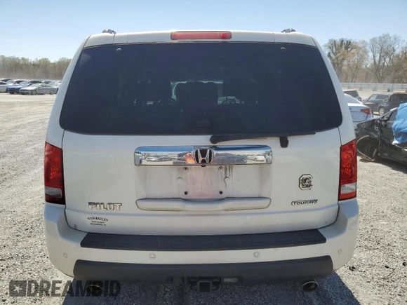 2011 Honda Pilot Touring z VIN 5FNYF3H9XBB044579, wystawiony jako Copart lot #50303125 z przebiegiem 227 482 mil mil oraz Szkoda całkowita • Salvage title. Historia ofert i sprzedaży dostępna na DreamBid. Obrazek 6.