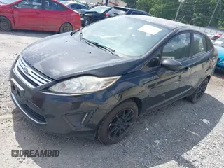 2011 Ford Fiesta SE z VIN 3FADP4BJ2BM172241, wystawiony jako IAAI lot #42500368 z przebiegiem 258 580 mil mil oraz . Historia ofert i sprzedaży dostępna na DreamBid. Obrazek 2.