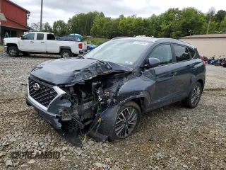 2019 Hyundai Tucson SEL z VIN KM8J3CAL1KU974955, wystawiony jako Copart lot #81512194 z przebiegiem Nie podano mil oraz Szkoda całkowita • Salvage title. Historia ofert i sprzedaży dostępna na DreamBid. Obrazek 1.
