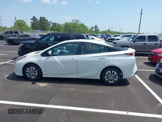 2017 Toyota Prius Two with VIN JTDKARFU7H3054054, listed as a IAAI auction lot 42028565 with 64,805 mi miles. Bid and sale history available at carsss.com. Image 14.