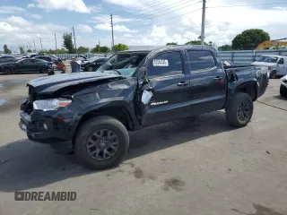 2023 Toyota Tacoma SR with VIN 3TYCZ5ANXPT136237, listed as a Copart auction lot 62584345 with 32,674 mi miles and Salvage title. Bid and sale history available at DreamBid. Image 1.