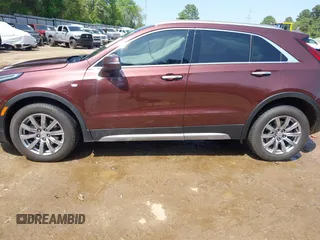 2023 Cadillac XT4 AWD Premium Luxury with VIN 1GYFZDR46PF125499, listed as a IAAI auction lot 41919403 with 44,647 mi miles and . Bid and sale history available at carsss.com. Image 14.