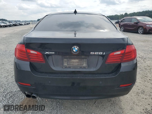 2014 BMW 5 Series 528i xDrive with VIN WBA5A7C56ED618181, listed as a Copart auction lot 73992504 with 180,563 mi miles and Salvage Title. Bid and sale history available at DreamBid. Image 6.
