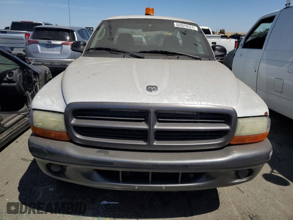 2002 Dodge Dakota with VIN 1B7GL12X92S701455, listed as a Copart auction lot 66929624 with 64,563 mi miles and Salvage Title. Bid and sale history available at carsss.com. Image 5.