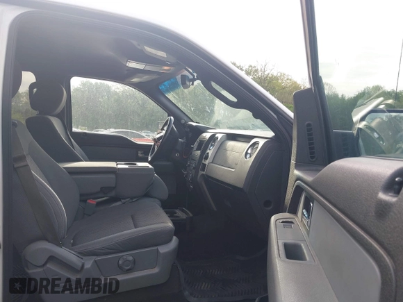 2014 Ford F-150 XL with VIN 1FTFW1EFXEKE92754, listed as a IAAI auction lot 42109551 with 219,130 mi miles. Bid and sale history available at carsss.com. Image 5.