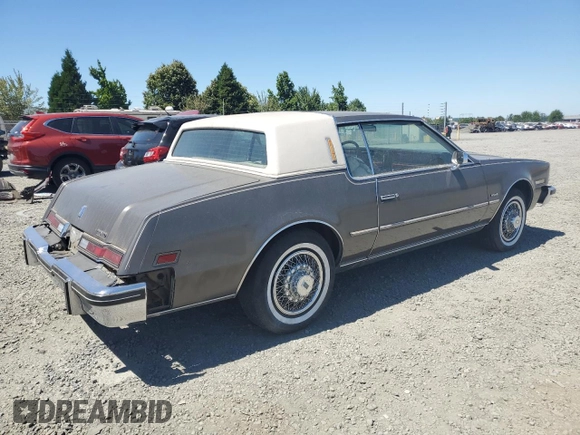 1983 Oldsmobile Toronado with VIN 1G3AZ57Y8DE312949, listed as a Copart auction lot 65228244 with 159,172 mi miles and Salvage Title. Bid and sale history available at DreamBid. Image 3.